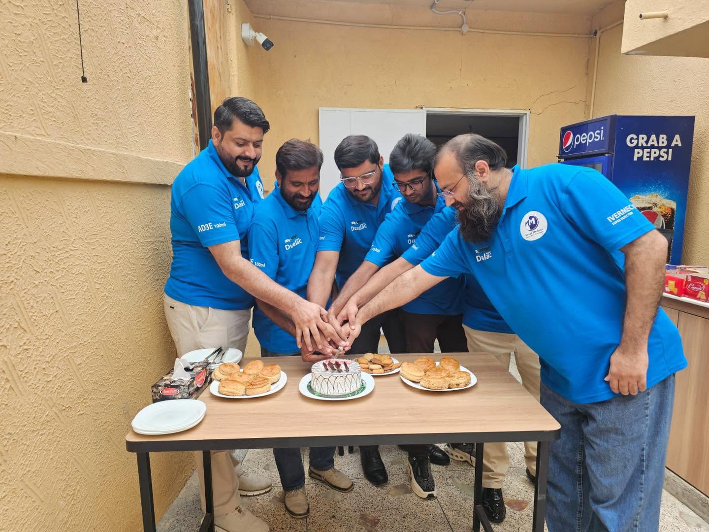 Minaa Medicos team celebrating a milestone